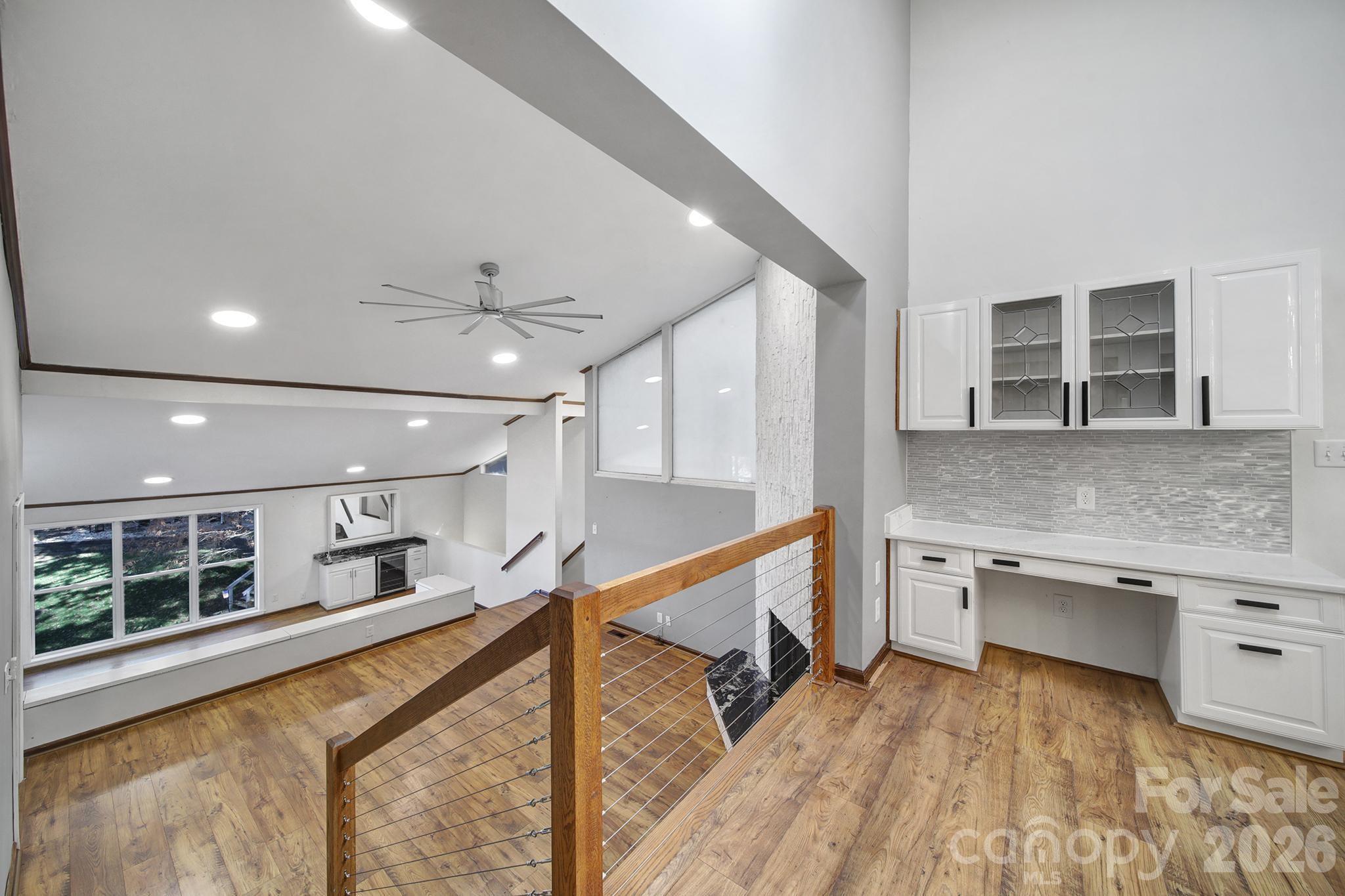 7005 Tega Cay Drive Tega Cay, SC 29708 - Photo 30 of 48 a kitchen with stainless steel appliances granite countertop a sink and stove top oven