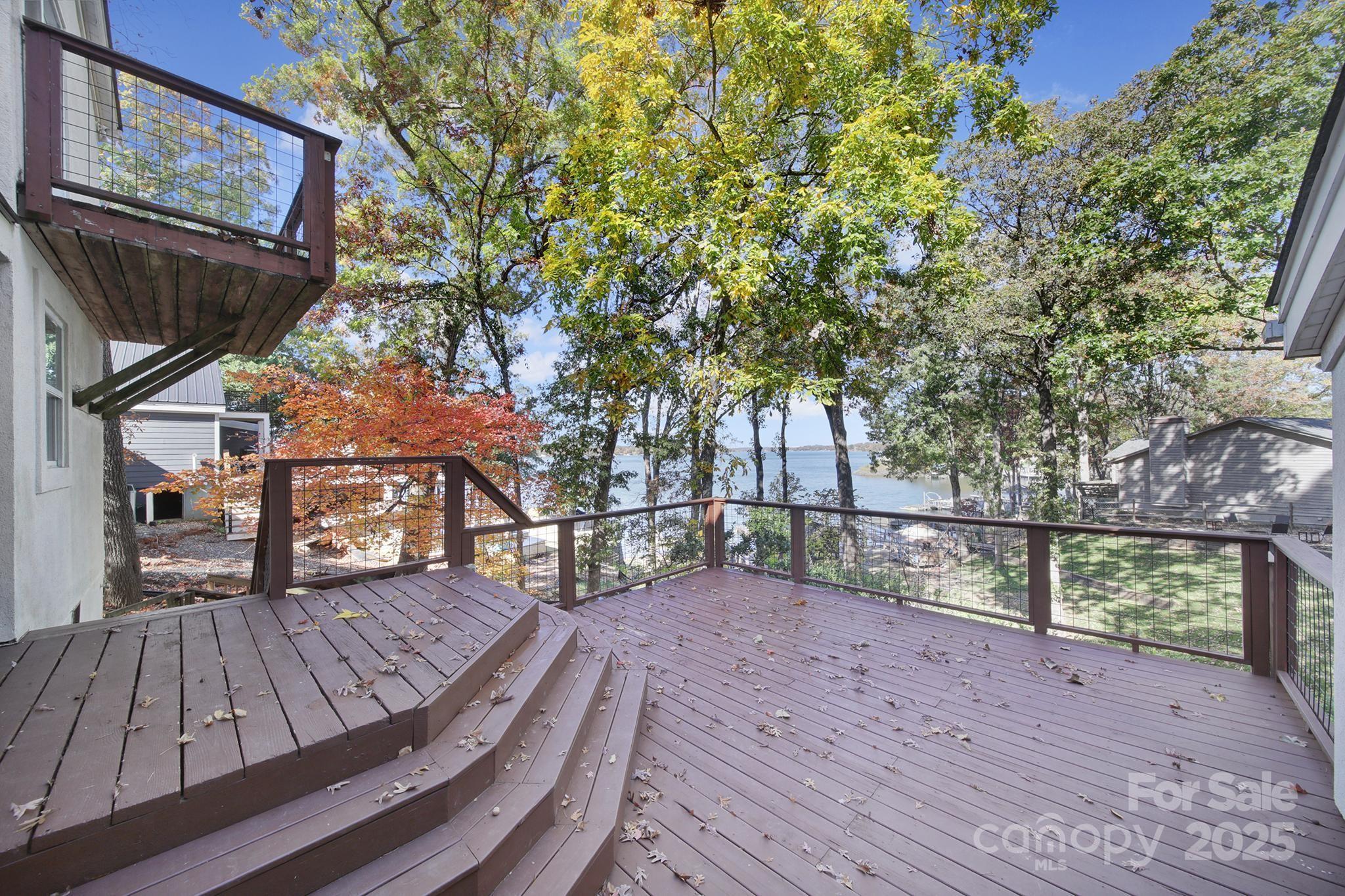 7005 Tega Cay Drive Tega Cay, SC 29708 - Photo 46 of 48 a view of deck with wooden floor and seating space