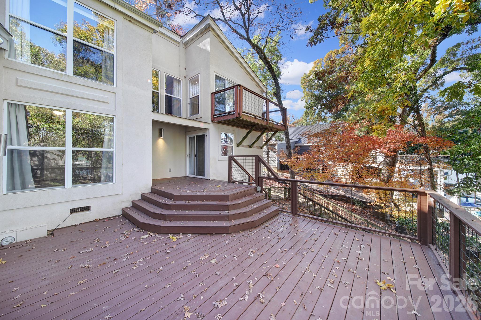 7005 Tega Cay Drive Tega Cay, SC 29708 - Photo 46 of 48 a front view of a house with a garden
