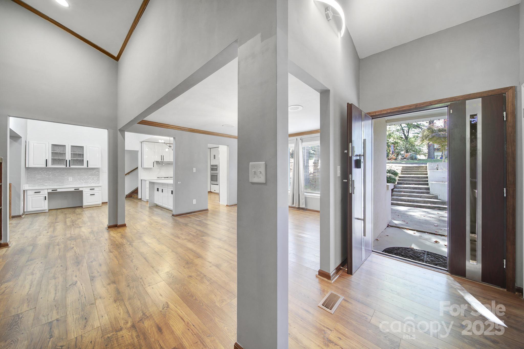 7005 Tega Cay Drive Tega Cay, SC 29708 - Photo 10 of 48 a view of livingroom with furniture and floor to ceiling window