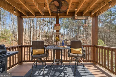 a view of a balcony with chairs