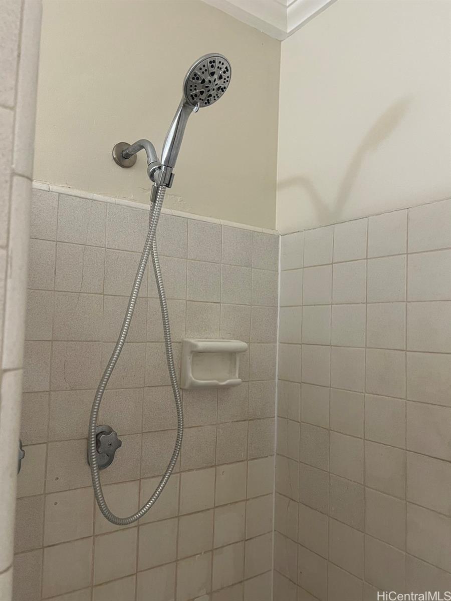 425 Ena Road, Unit B1002 Honolulu, HI 96815 - Photo 17 of 20 a bathroom with a shower