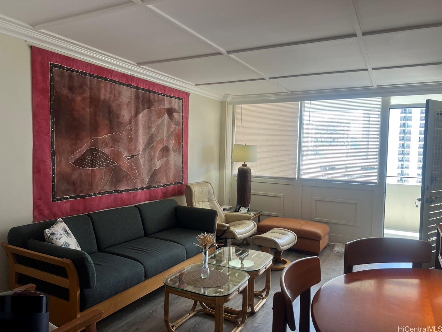 425 Ena Road, Unit B1002 Honolulu, HI 96815 - Photo 2 of 20 a living room with furniture and a large window