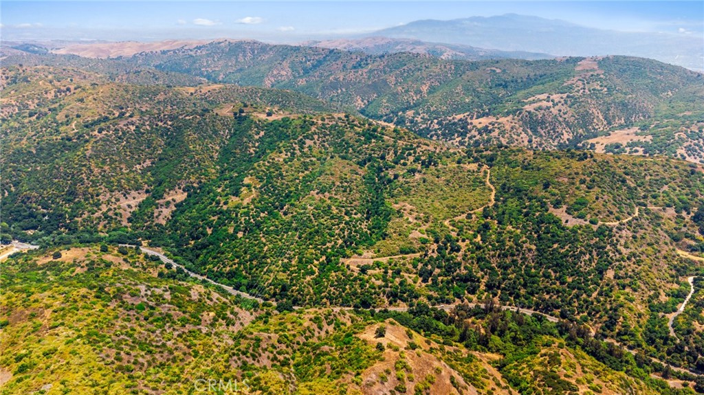 7099 Carbon Canyon Road Brea, CA 92823 - Photo 6 of 17 a view of a city with mountain