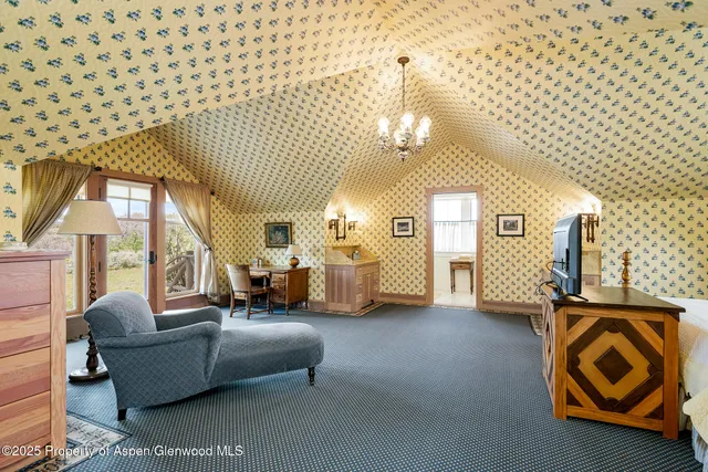 a bathroom with bathtub and shower
