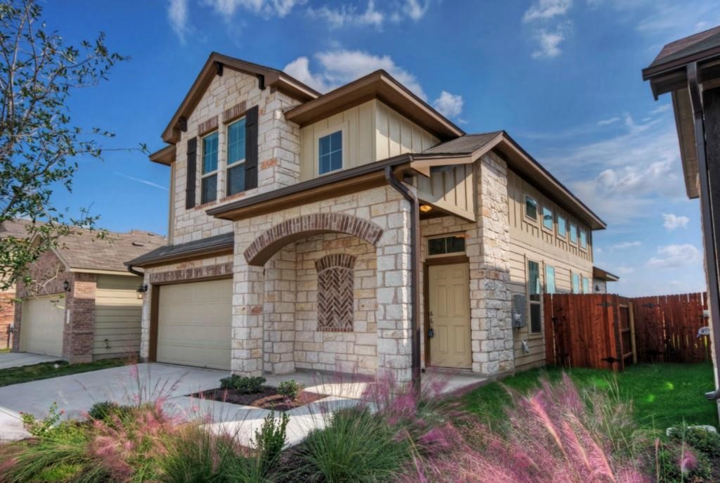 16117 McAloon Way Austin, TX 78728 - Photo 1 of 1 a front view of a house with a yard