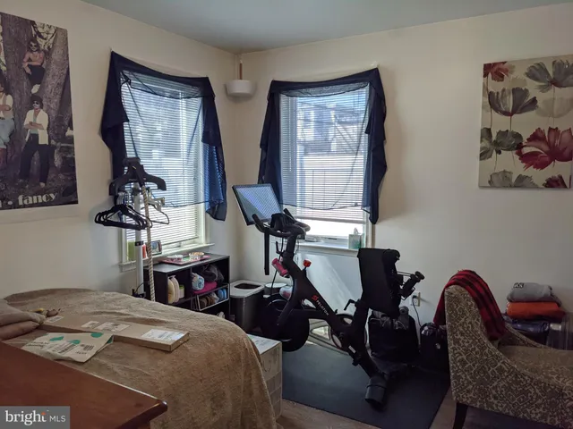 a bed room with a bed and a table