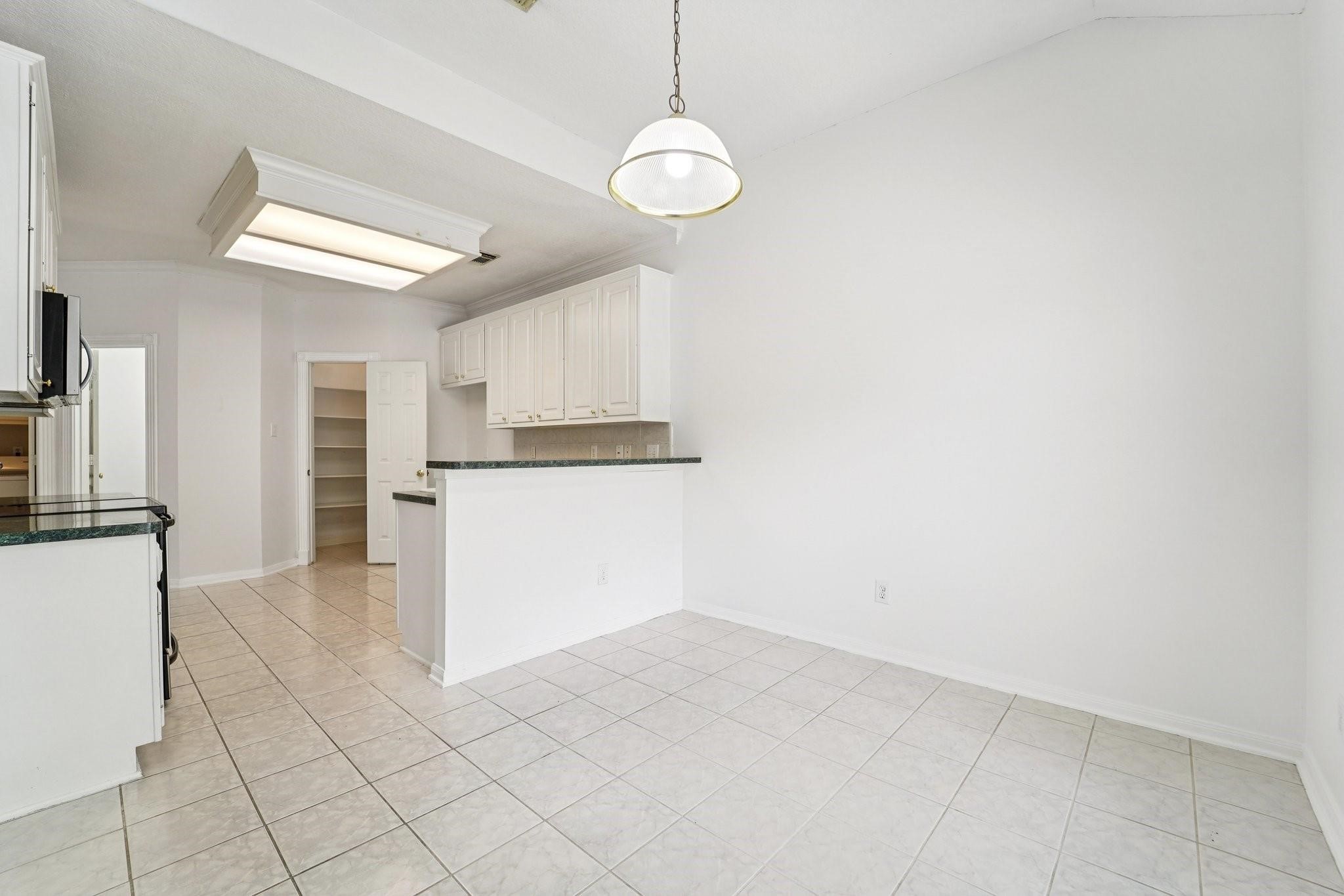 14420 Walters Road, Unit 55 Houston, TX 77014 - Photo 11 of 35 a view of a kitchen with a sink