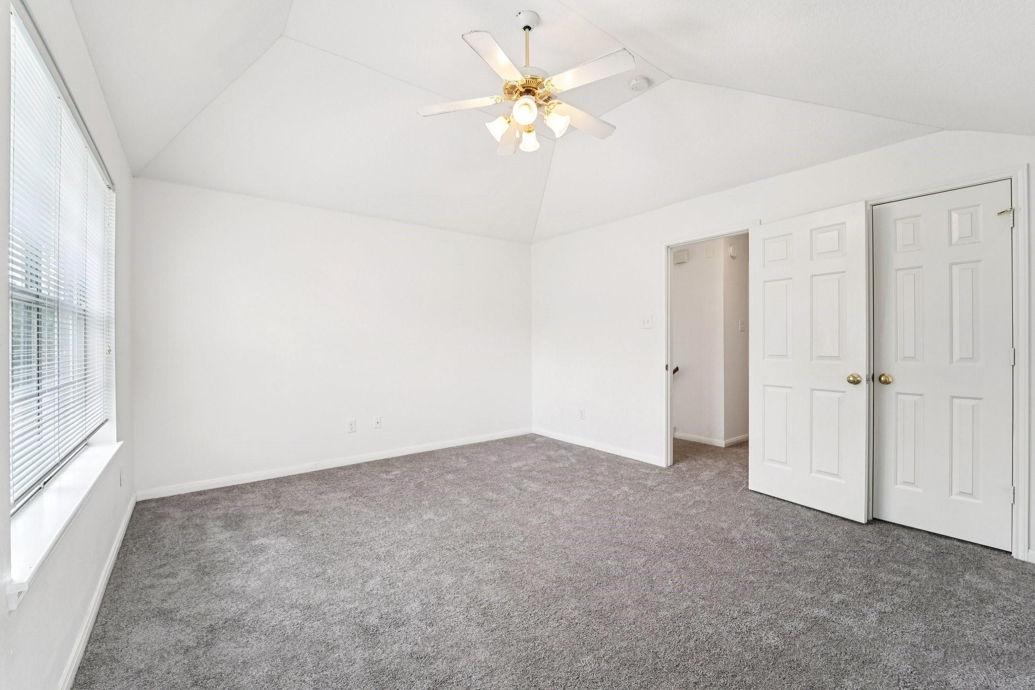 14420 Walters Road, Unit 55 Houston, TX 77014 - Photo 29 of 35 wooden floor in an empty room with a window