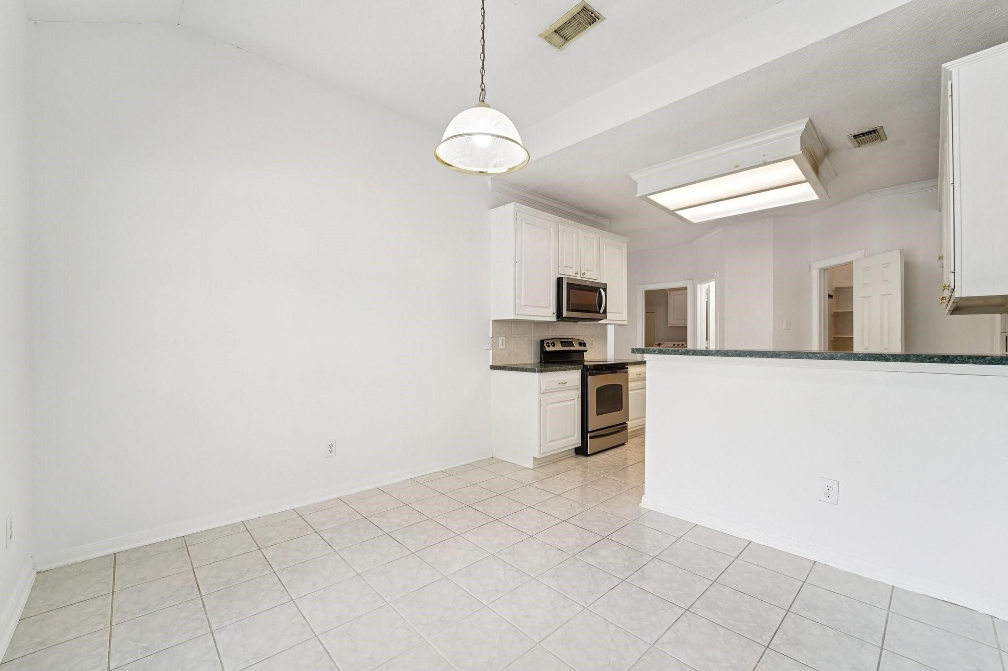 14420 Walters Road, Unit 55 Houston, TX 77014 - Photo 9 of 35 a view of kitchen with sink and refrigerator