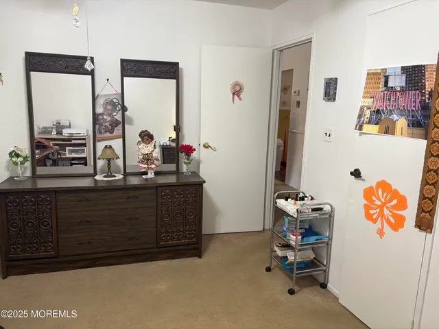 a room with a window and gym equipment