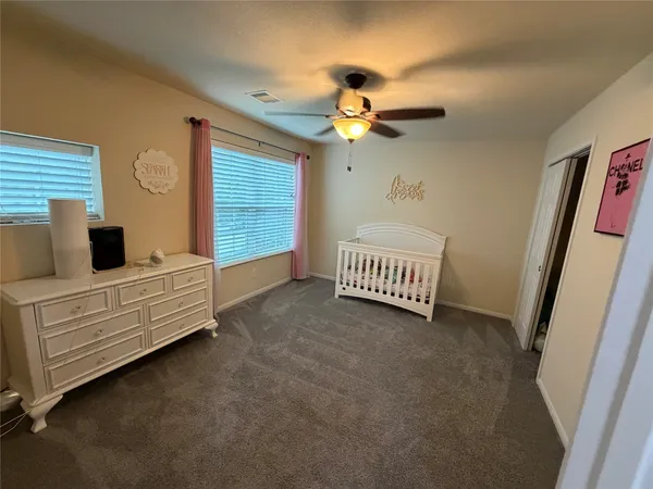 a living room with furniture and window