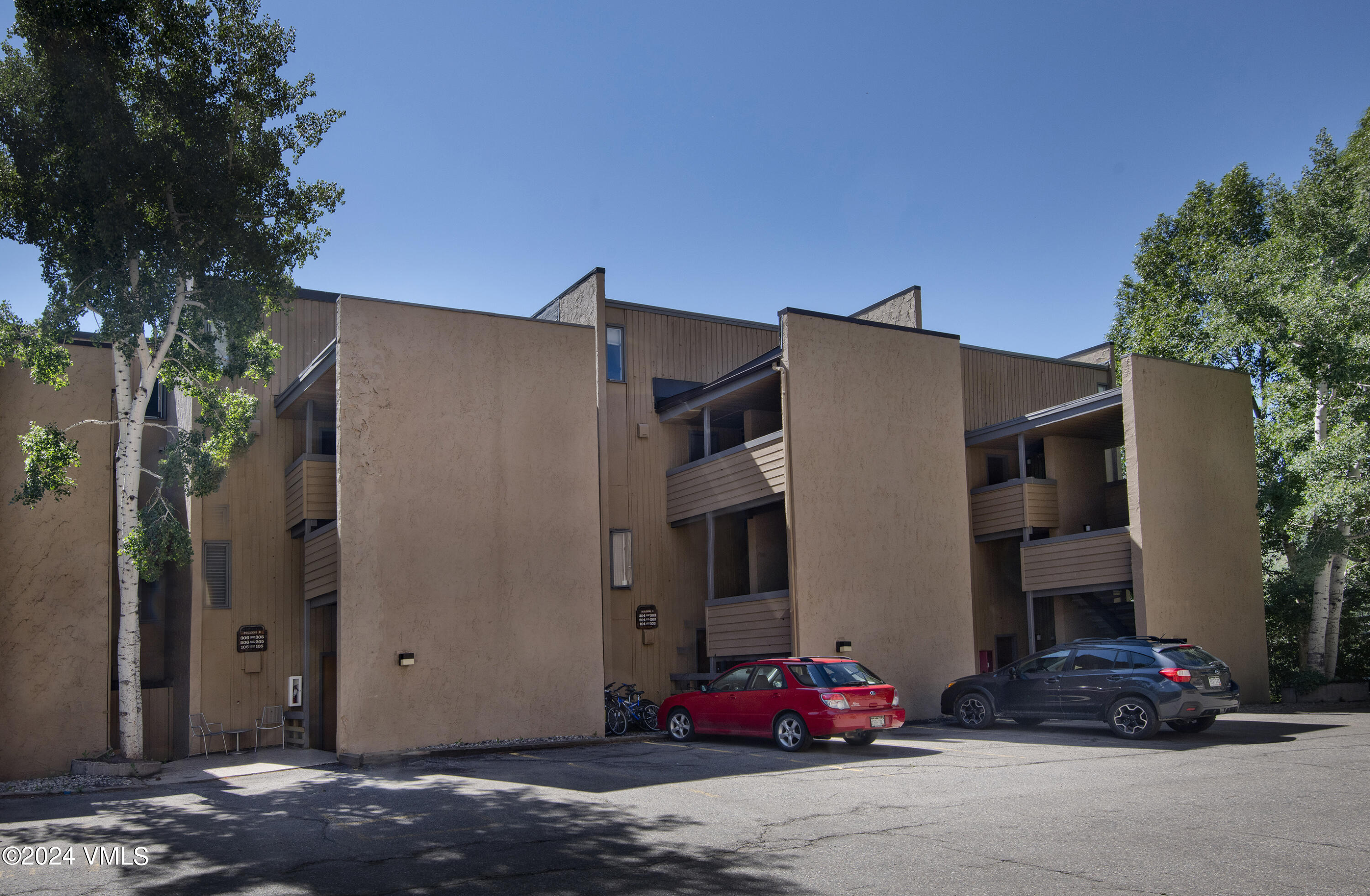 1081 Vail View Drive, Unit B208 Vail, CO 81657 - Photo 19 of 22 a car parked in front of a house