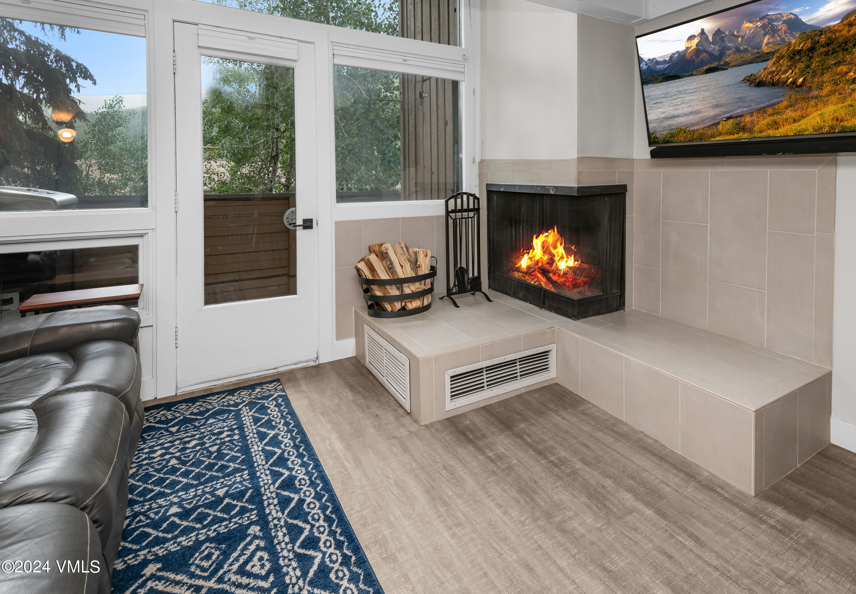 1081 Vail View Drive, Unit B208 Vail, CO 81657 - Photo 5 of 22 a living room with furniture and a fireplace