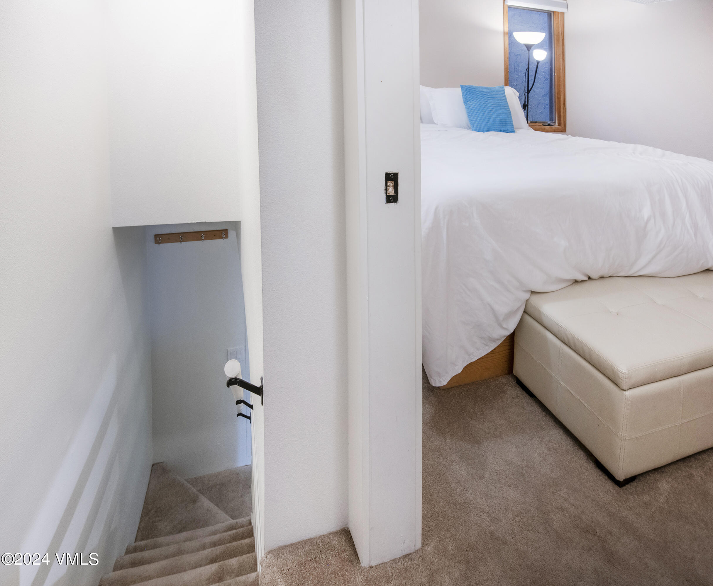 1081 Vail View Drive, Unit B208 Vail, CO 81657 - Photo 10 of 22 a bedroom with a bed and a couch