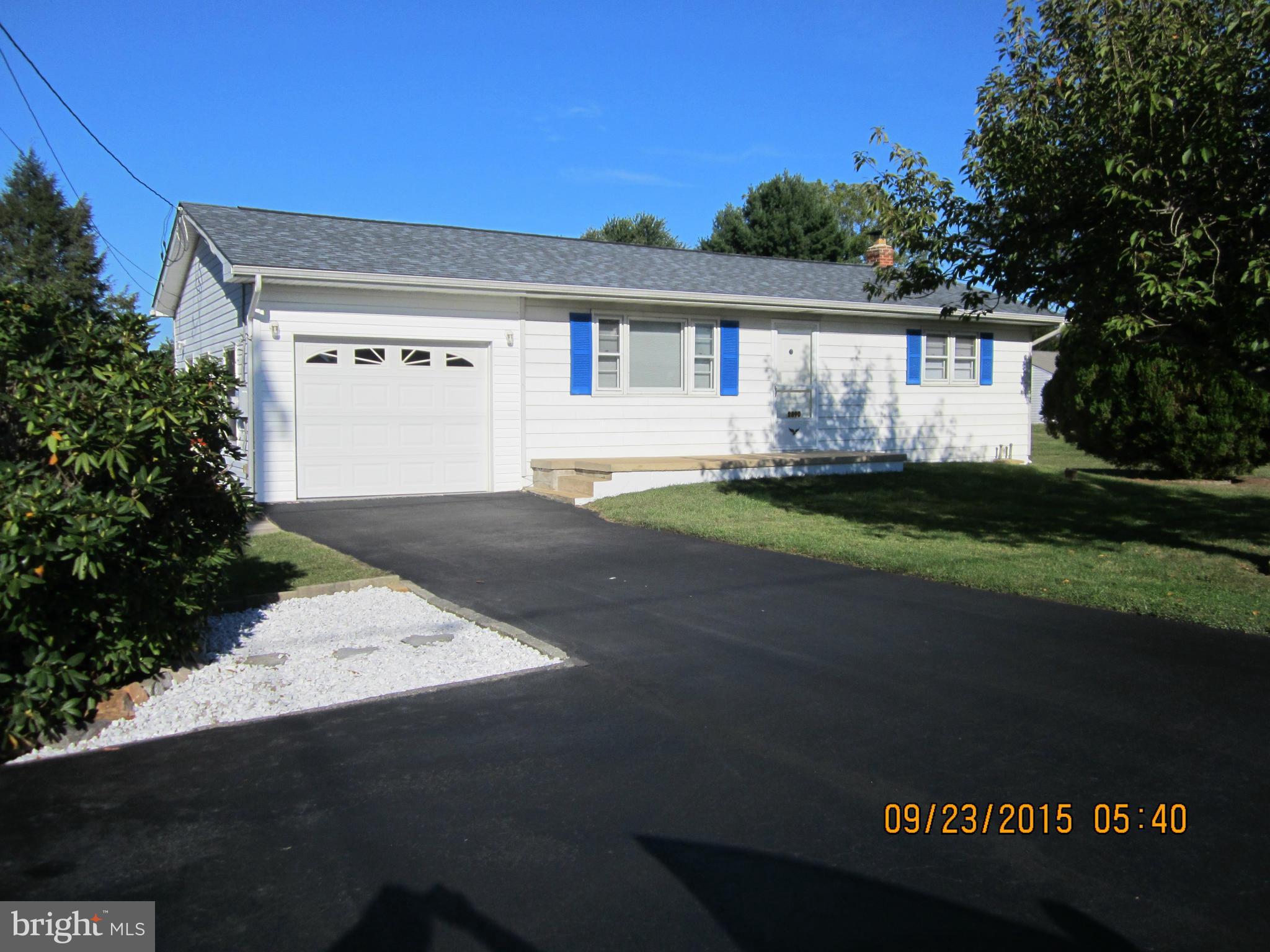2890 Singerly Road Elkton, MD 21921 - Photo 27 of 28 a front view of a house with a garden and yard