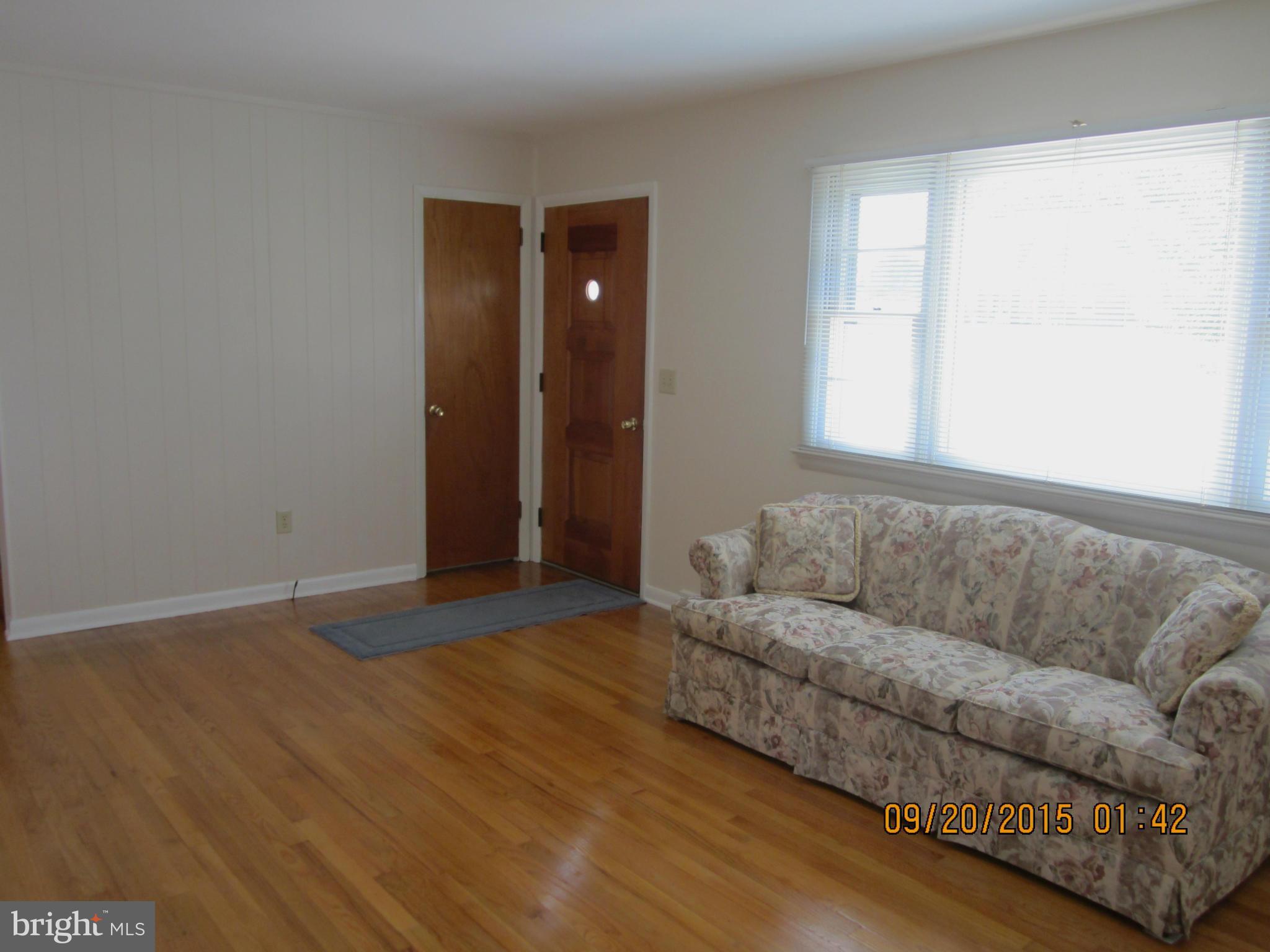 2890 Singerly Road Elkton, MD 21921 - Photo 9 of 28 a living room with furniture and a window