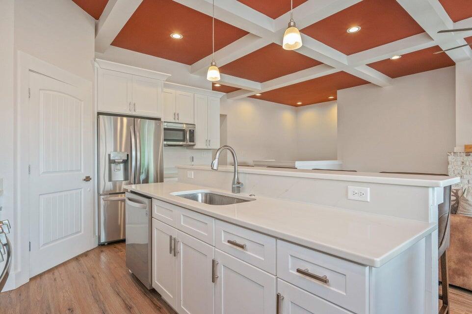 508 Harborview Circle Niceville, FL 32578 - Photo 16 of 60 a kitchen with stainless steel appliances a sink and a refrigerator