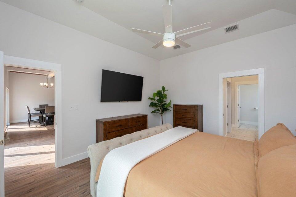 508 Harborview Circle Niceville, FL 32578 - Photo 21 of 60 a bedroom with a bed and a flat screen tv