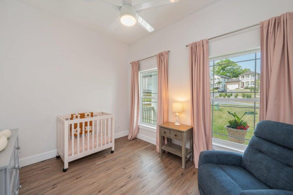 508 Harborview Circle Niceville, FL 32578 - Photo 27 of 60 a living room with furniture and wooden floor