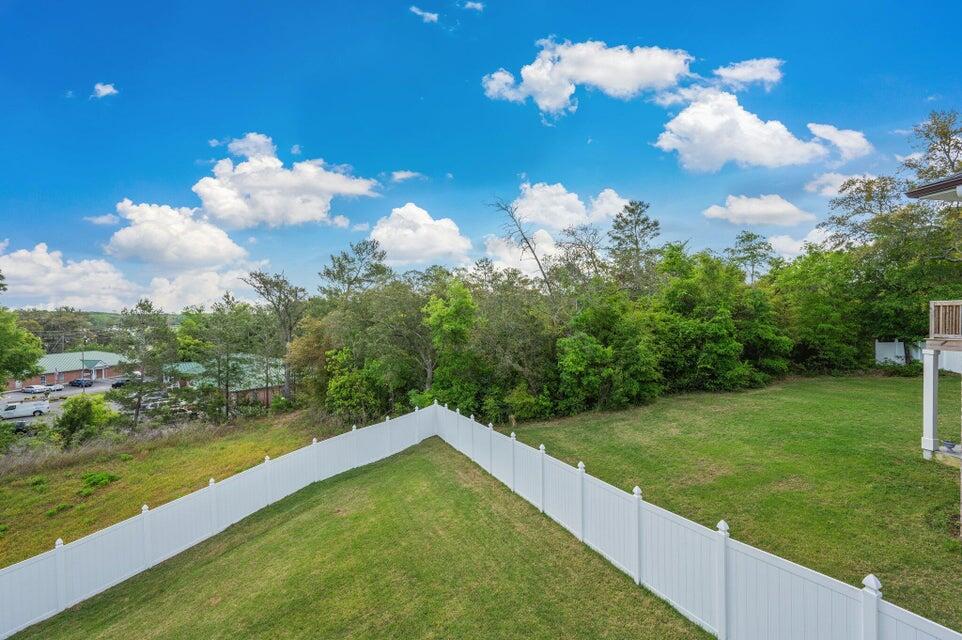 508 Harborview Circle Niceville, FL 32578 - Photo 39 of 60 a view of a lake with a big yard