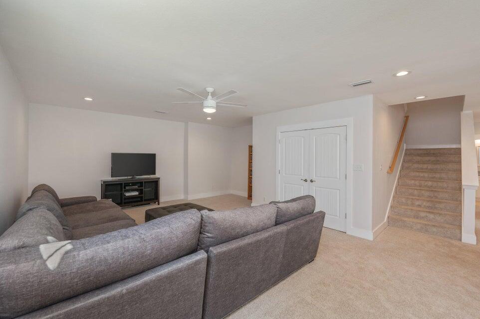 508 Harborview Circle Niceville, FL 32578 - Photo 41 of 60 a living room with furniture and a flat screen tv