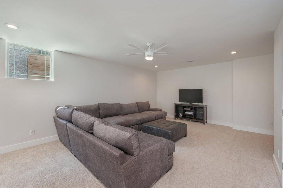 508 Harborview Circle Niceville, FL 32578 - Photo 44 of 60 a living room with furniture and a flat screen tv