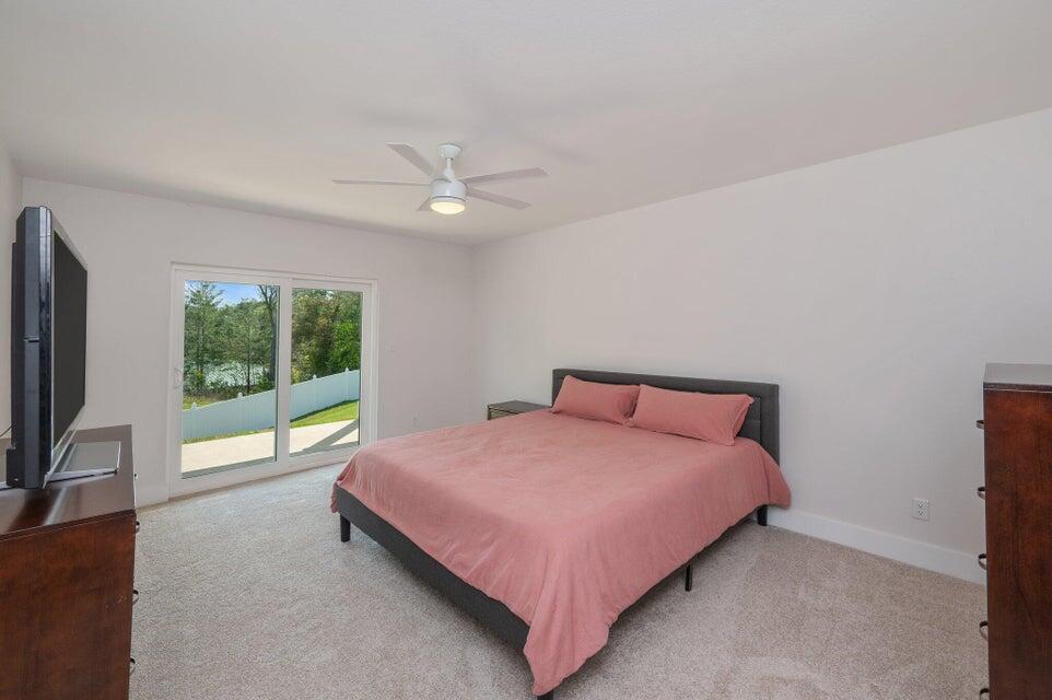 508 Harborview Circle Niceville, FL 32578 - Photo 47 of 60 a bedroom with a bed and a large window