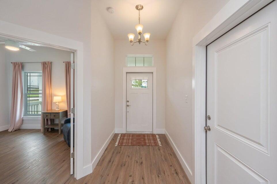 508 Harborview Circle Niceville, FL 32578 - Photo 6 of 60 a view of livingroom with hardwood floor and a ceiling fan