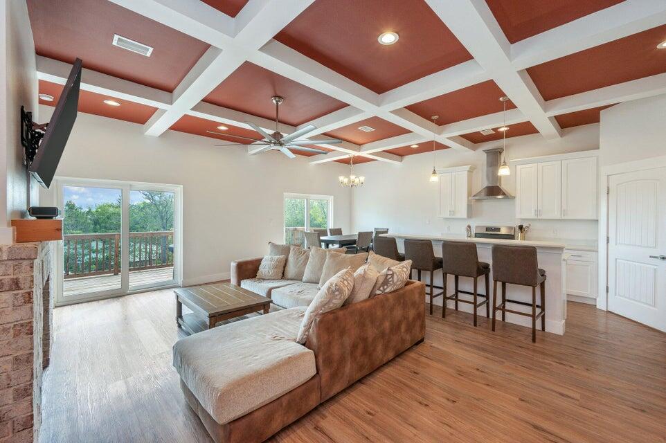 508 Harborview Circle Niceville, FL 32578 - Photo 9 of 60 a living room with furniture and a wooden floor