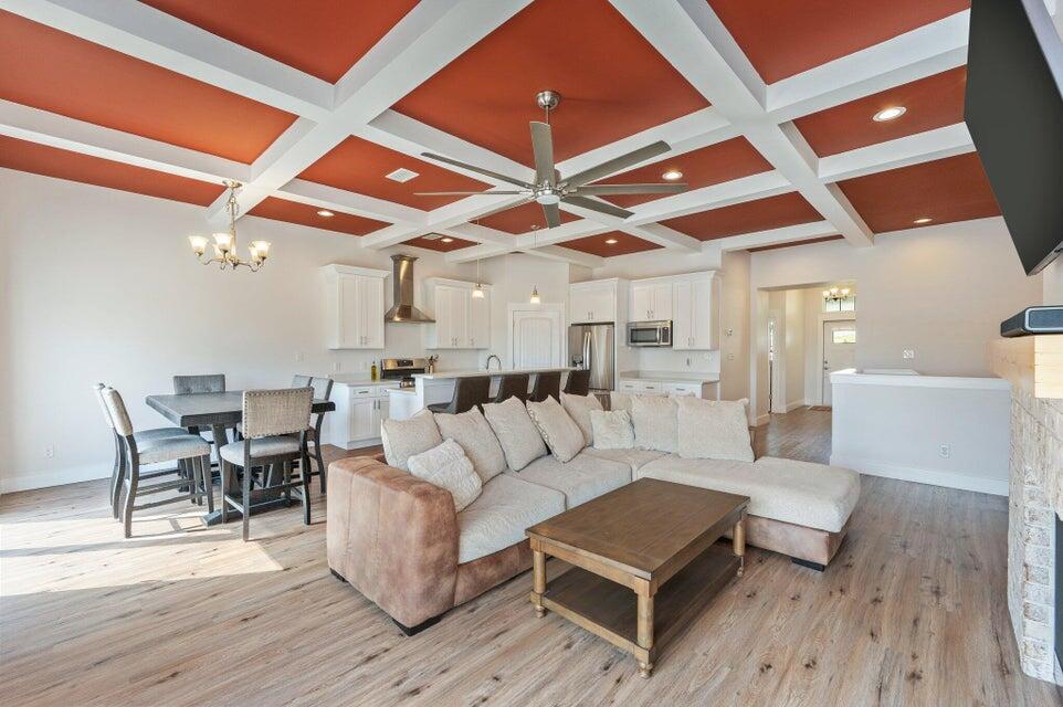 508 Harborview Circle Niceville, FL 32578 - Photo 10 of 60 a living room with furniture and a wooden floor