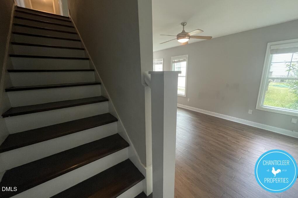 912 Chaney Road, Unit 100 Raleigh, NC 27606 - Photo 10 of 18 a view of entryway and hall with wooden floor