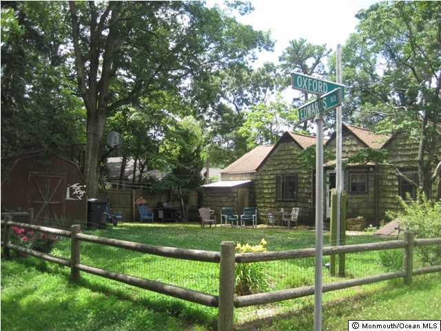 25 Buckingham Road Brick, NJ 08723 - Photo 5 of 11 a front view of a house with yard