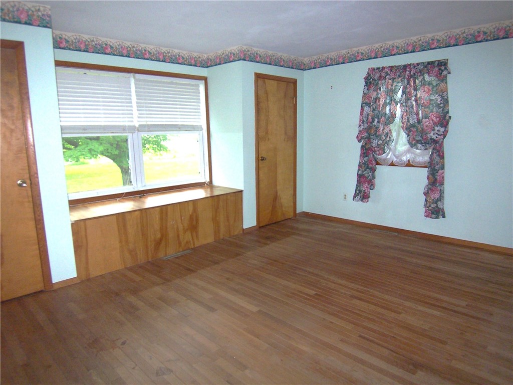 934 County Road 7 Manchester, NY 14432 - Photo 12 of 26 First floor master bedroom off the family room