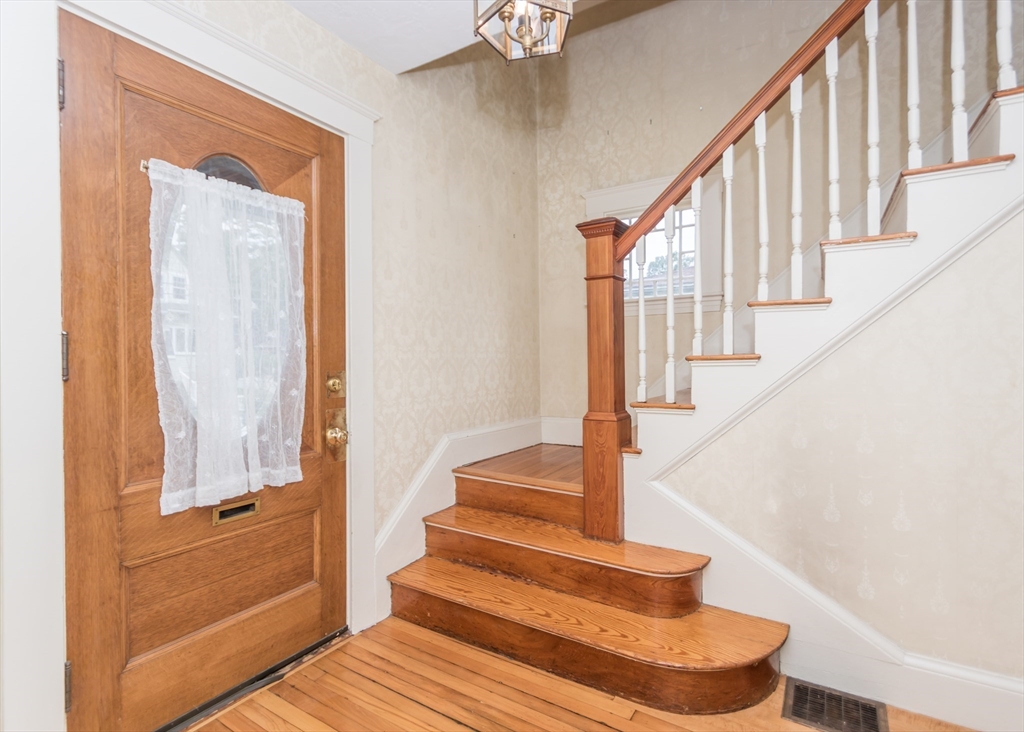 37 Summit Street Waltham, MA 02451 - Photo 5 of 29 a view of entryway and hall with wooden floor