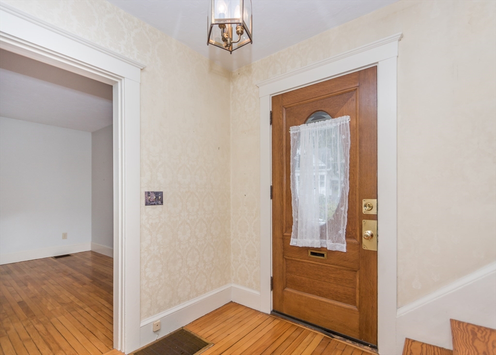 37 Summit Street Waltham, MA 02451 - Photo 6 of 29 a view of a bathroom from the hallway