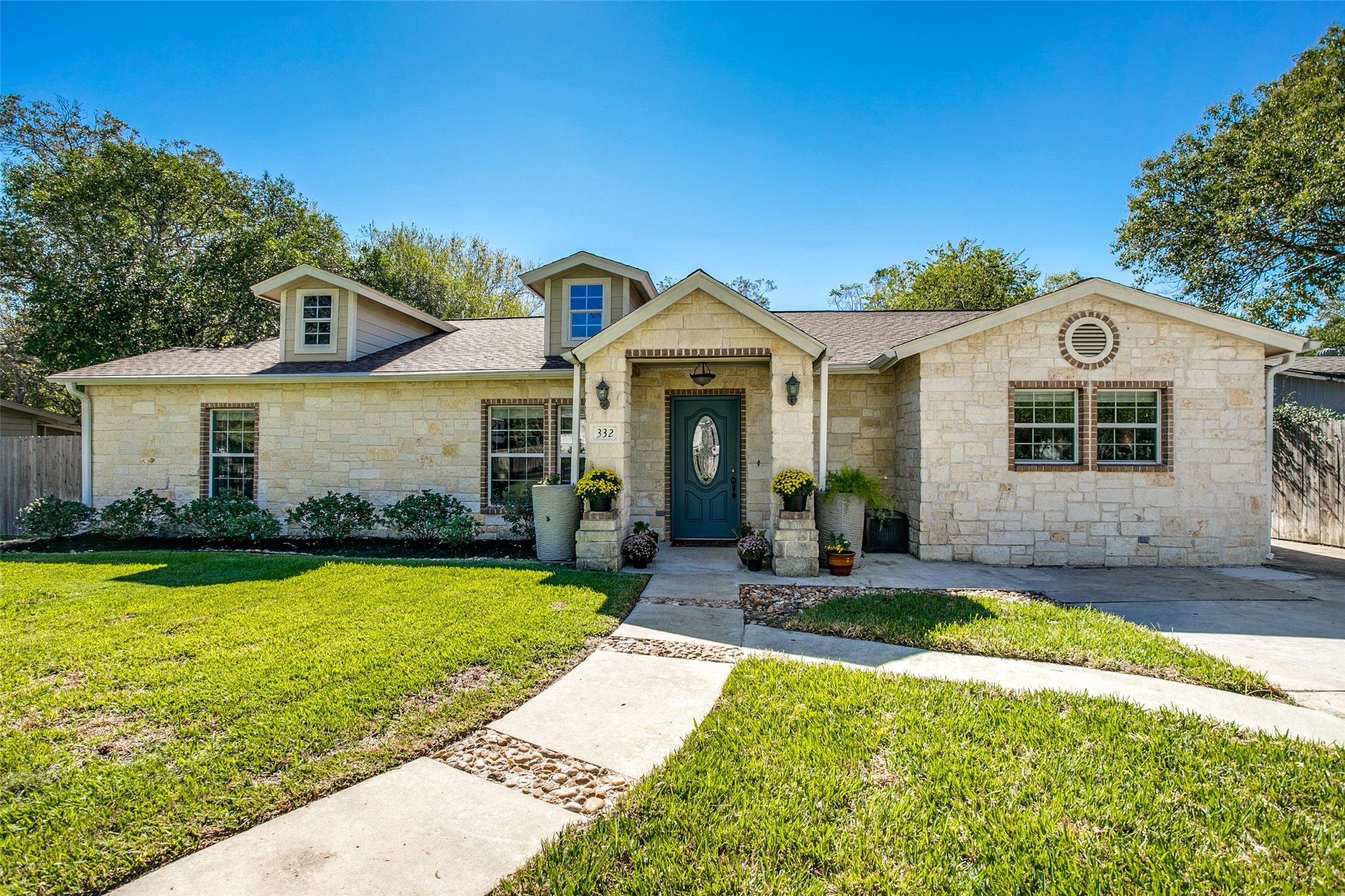 332 Tuttle Road Terrell Hills, TX 78209 - Photo 1 of 25 a front view of a house with a yard