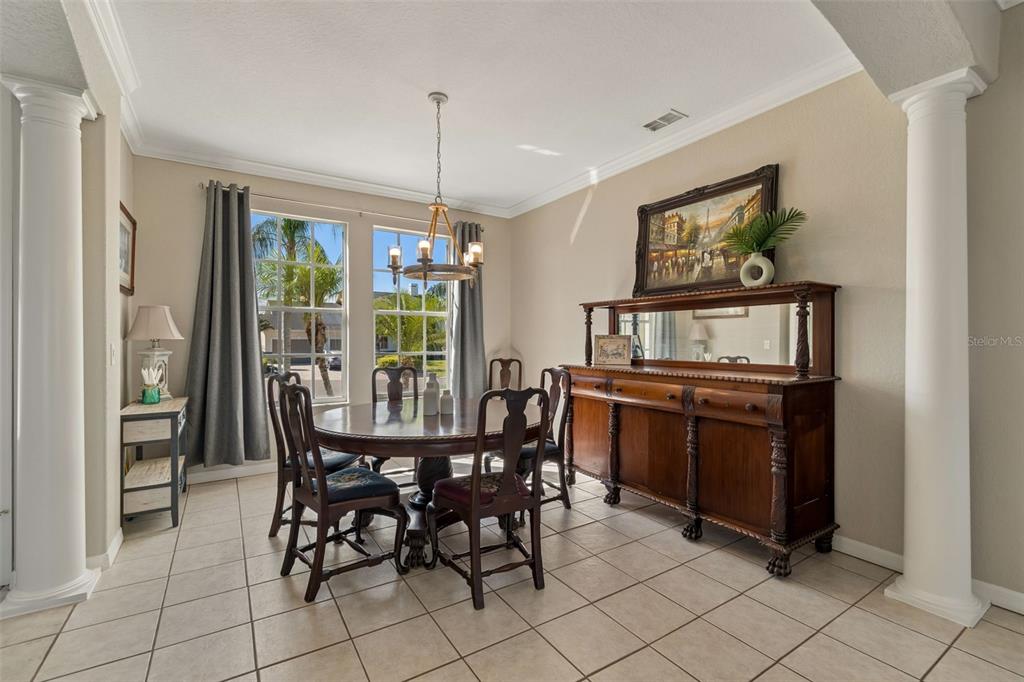 703 Bunker View Drive Apollo Beach, FL 33572 - Photo 7 of 49 a view of a dining room with furniture window and outside view