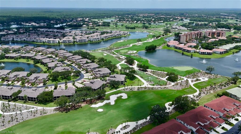 680 Lalique Circle, Unit 1205 Naples, FL 34119 - Photo 22 of 32 an aerial view of lake residential houses with outdoor space and lake view