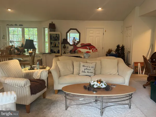 a view of kitchen and dining area with furniture