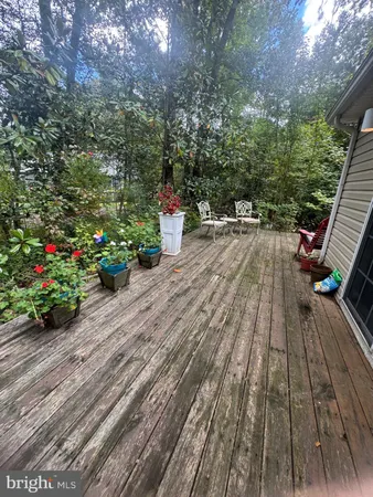 a view of a terrace with sitting area