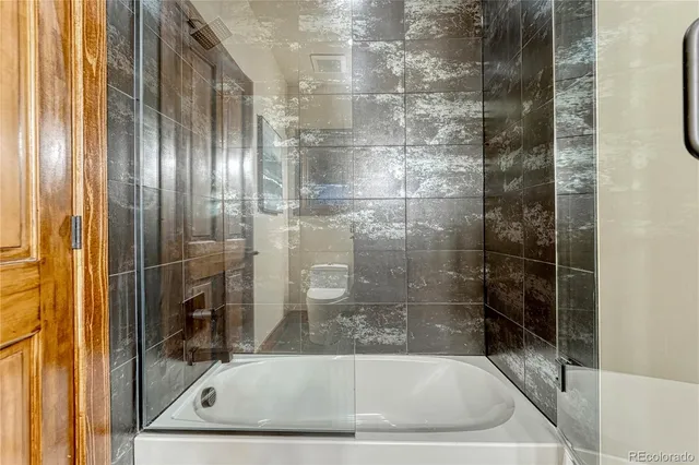 a bathroom with a bathtub