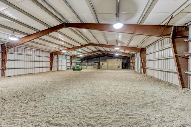 a view of hallway with wooden floor