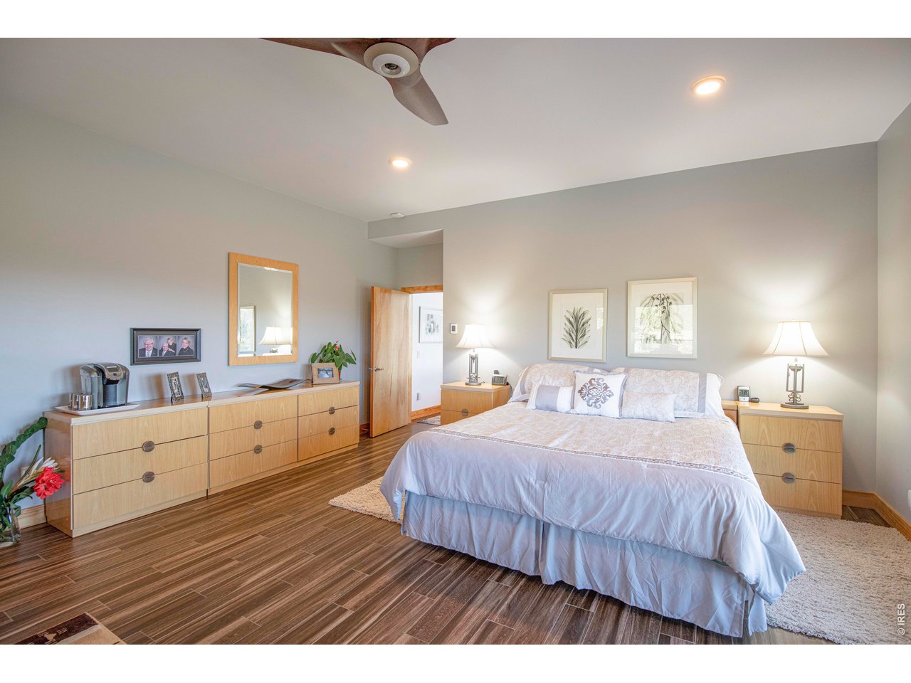 91 Eagle Rising Place Livermore, CO 80536 - Photo 12 of 38 a bedroom with a bed and a dresser