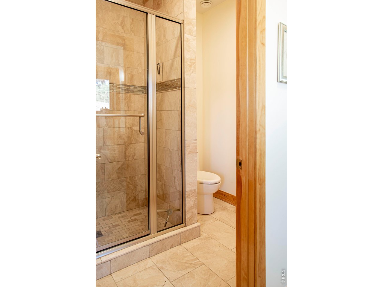 91 Eagle Rising Place Livermore, CO 80536 - Photo 18 of 38 a bathroom with a granite countertop shower and a sink