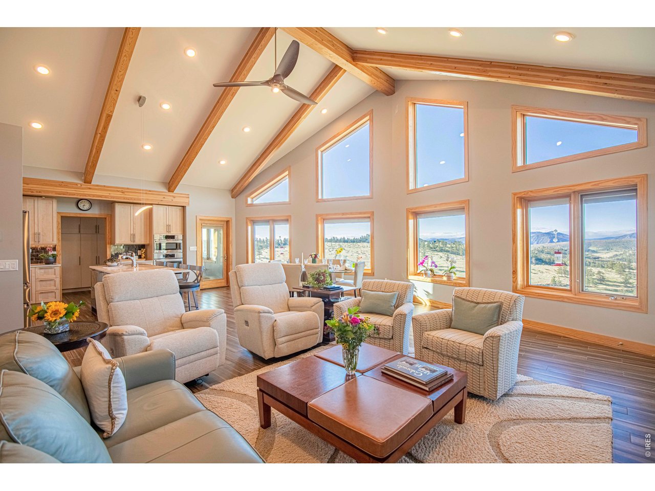 91 Eagle Rising Place Livermore, CO 80536 - Photo 7 of 38 a living room with furniture and a large window