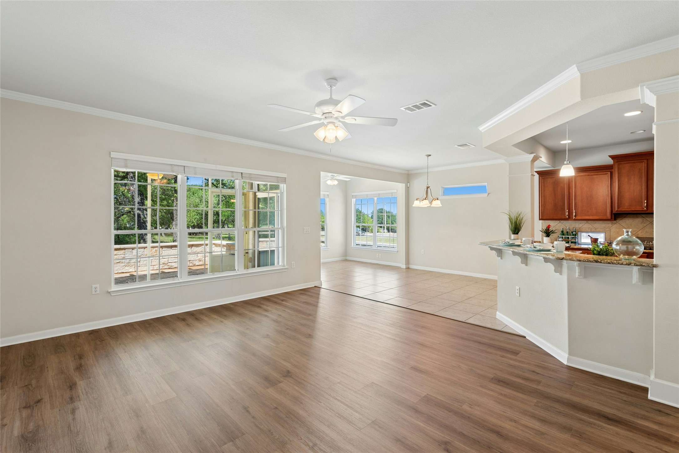 405 Fieldstone Drive Georgetown, TX 78633 - Photo 11 of 32 Kitchen overlooking the living, dining, sunroom area as well as fabulous view