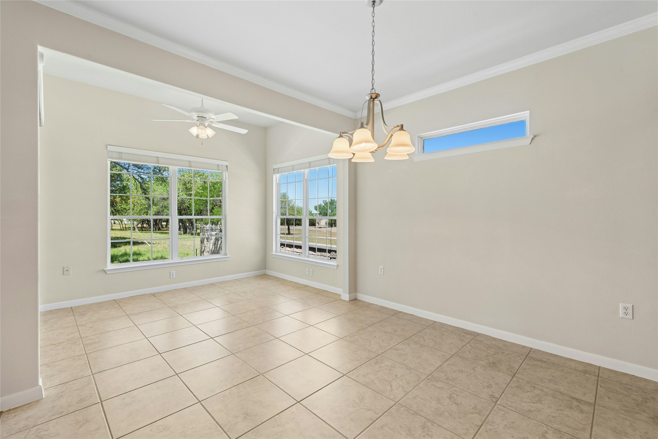 405 Fieldstone Drive Georgetown, TX 78633 - Photo 14 of 32 Dining room overlooking the sun room