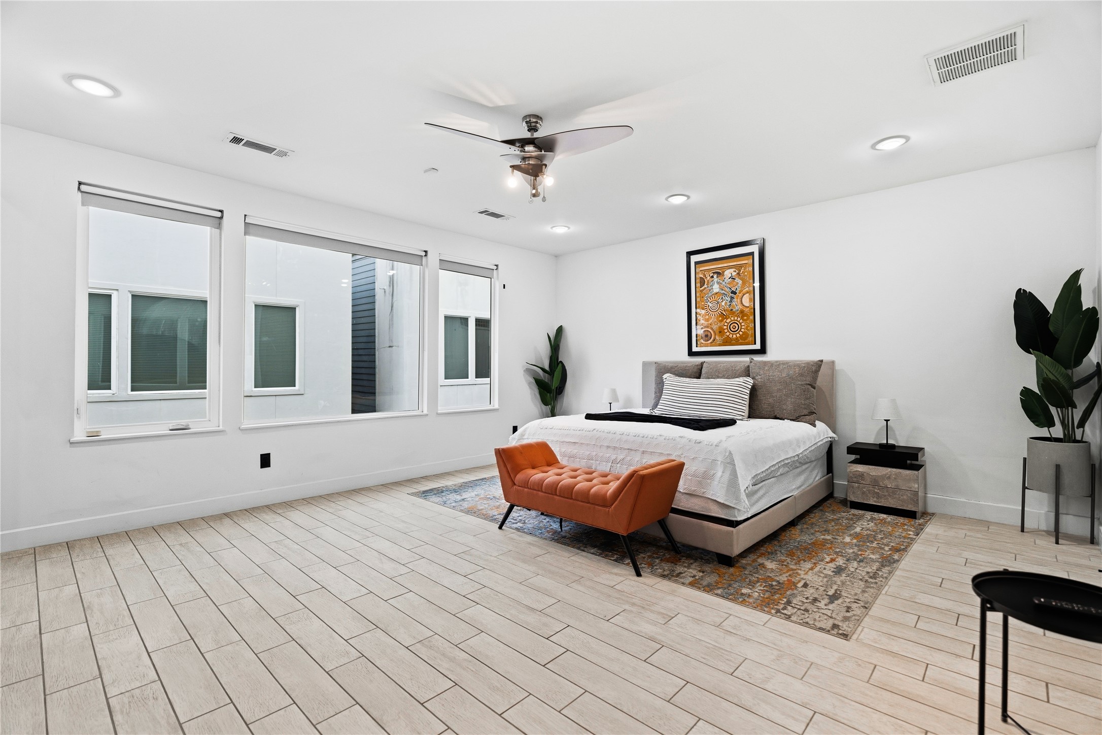 2025 Colquitt Street, Unit A Houston, TX 77098 - Photo 24 of 40 a bedroom with furniture and window