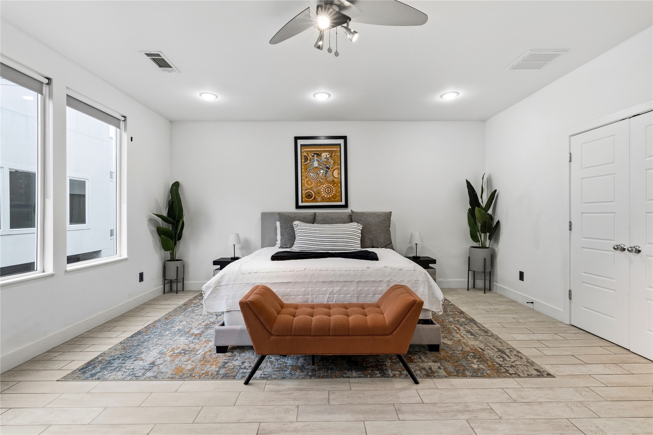 2025 Colquitt Street, Unit A Houston, TX 77098 - Photo 26 of 40 a bed room with a bed and a chandelier
